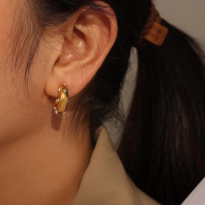Adler | 18k gold plated earrings.