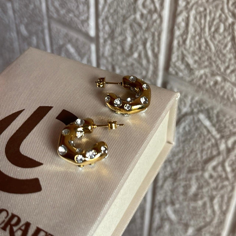 Adler | 18k gold plated earrings.