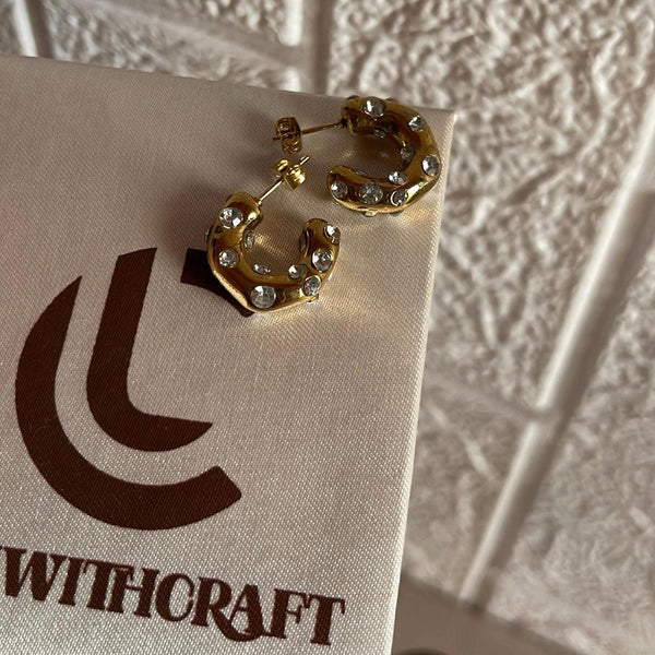 Adler | 18k gold plated earrings.
